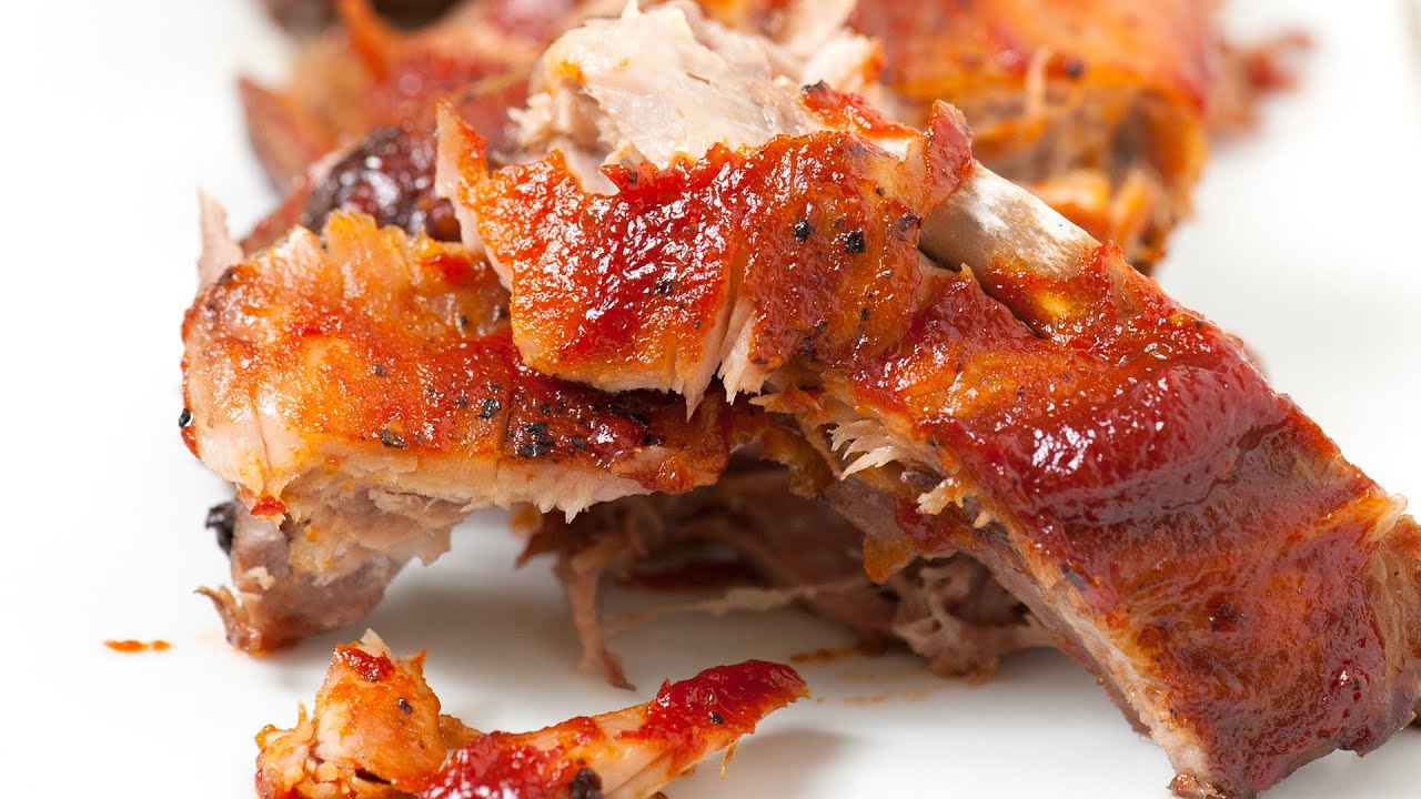 Barbecue ribs with sauce on a plate.